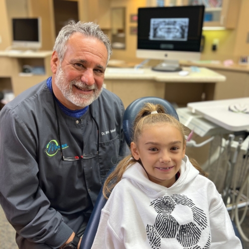 Dr. Mendlik and patient Mendlik Orthodontics in Omaha, Fremont, and Columbus, NE